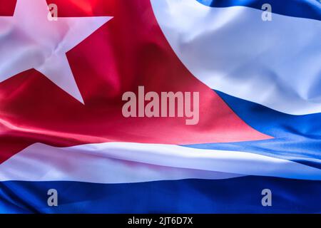 A closeup shot of deep tones of the ruffled flag of Cuba Stock Photo