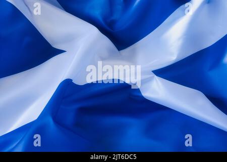 A closeup shot of deep tones of the ruffled flag of Scotland Stock Photo