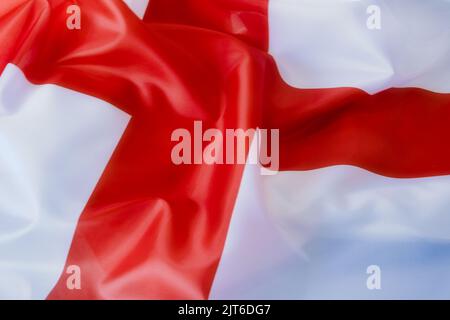 A closeup shot of deep tones of the ruffled flag of England Stock Photo