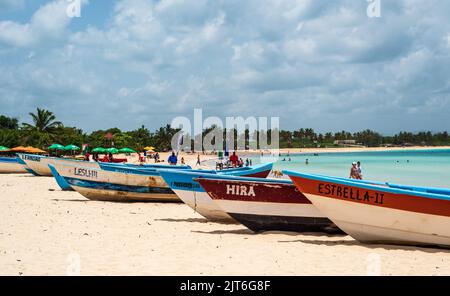 Punta Cana/ Dominican Republic - June 12 2016: Colorful rowboats on beach shoreline in Punta Cana, Dominican Republic. Stock Photo