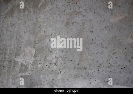Grey texture of a decorative old rough stucco for a wall abstract background design. Stock Photo