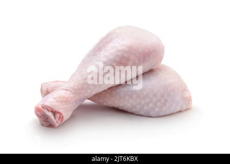 Two fresh raw chicken legs isolated on white. Stock Photo