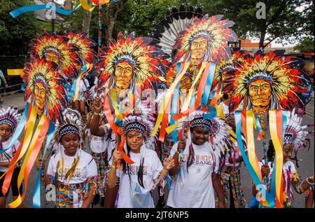 London, UK 28 Aug 2022Family day at the Notting Hill Carnival. Notting Hill Carnival returns to the streets of West London after three years. It is the second biggest carnival in the world celebrating Caribbean culture and this years theme is 'A time to remember'. Credit: Karl Black/Alamy Live News Stock Photo