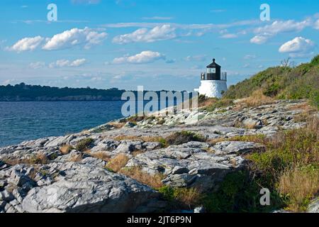 Castle Hill lighthouse in Newport, Rhode Island, overlooking Narragansett Bay from a rocky shoreline -12 Stock Photo