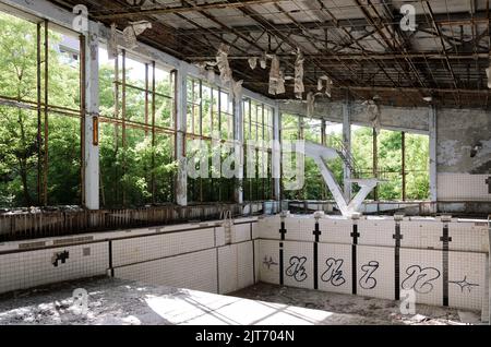 Prypiat Swimming-pool in the Chernobyl exclusion zone, Ukraine Stock Photo