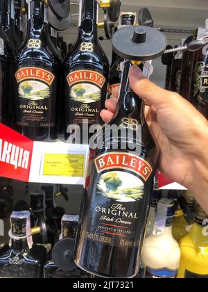 24.08.2022, Ukraine, Kharkov: Illustrative editorial of a bottle of bailey's Irish cream on the store shelf Stock Photo