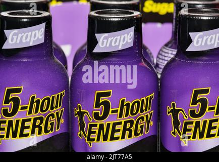 Houston, Texas USA 08-07-2022: 5-hour energy shot drinks, grape flavor closeup on a supermarket display. Manufactured by Living Essentials LLC company Stock Photo