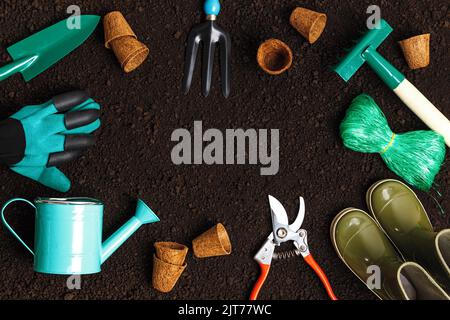 Garden tools for working on the soil. Frame top view flat lay Stock Photo