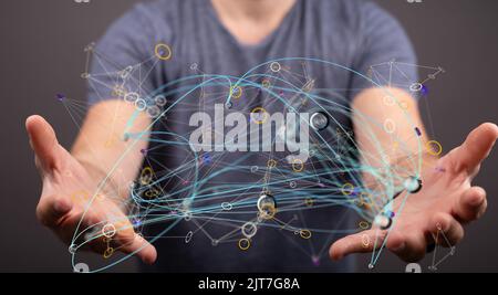The network web twisted between the hands of a human - future technology concept Stock Photo