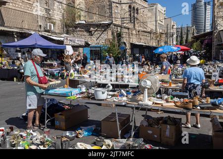 Haifa, Israel - 20 July 2022, Scene of the flea market, with sellers and shoppers, in downtown Haifa, Israel Stock Photo