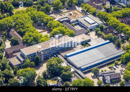 Aerial view, Osterfeld comprehensive school with construction site Westfälische Straße, Osterfeld, Oberhausen, Ruhr area, North Rhine-Westphalia, Germ Stock Photo