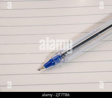 White notebook with lines can and pen Stock Photo