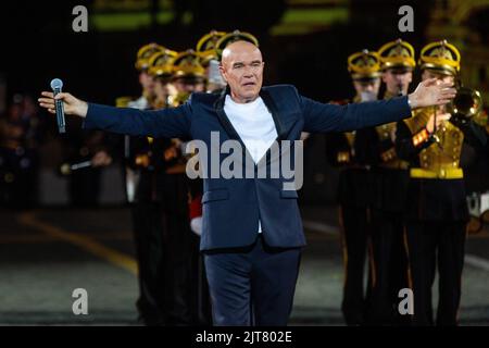 Moscow, Russia. 26th of August, 2022. Russian singer and musician Sergey Mazaev performs during an evening show ahead of the opening of the Spasskaya Tower 2022 International Military Music Festival in Red Square in Moscow, Russia.Sergey Mazaev is a lead singer of the Russian rock band 'Moral Codex' Stock Photo