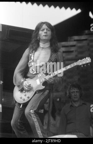Guitarist Luther Grosvenor performing with British band Widowmaker at “The Who Put the Boot In” rock festival, Charlton Athletic Football Club, London, on 31st May 1976. Stock Photo