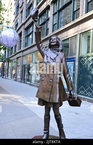The Mary Tyler Moore statue located in front of Dayton's on Nicollet Mall in Minneapolis in 2022, 21 years after the statue was first unveiled. Stock Photo