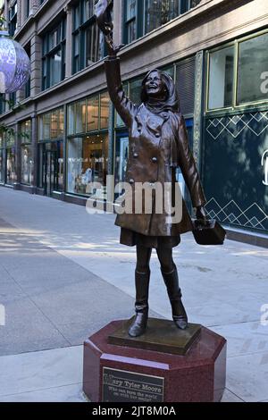 The Mary Tyler Moore statue located in front of Dayton's on Nicollet Mall in Minneapolis in 2022, 21 years after the statue was first unveiled. Stock Photo