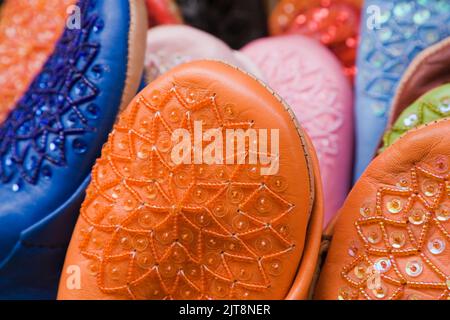 Slippers for sale at Arab souk in Granada, Spain. Stock Photo