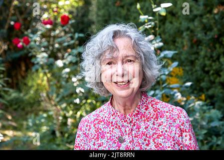 Hamburg, Germany. 24th Aug, 2022. Ulla Hahn, writer, stands in her garden after an interview about her new novel 'Days in Vitopia'. The book will be published Aug. 31, 2022, by Penguin in Munich. (to dpa 'Author Ulla Hahn does not need much to live') Credit: Georg Wendt/dpa/Alamy Live News Stock Photo