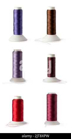 collection of spool of colorful color sewing thread used in fabric and textile industry isolated on white background Stock Photo