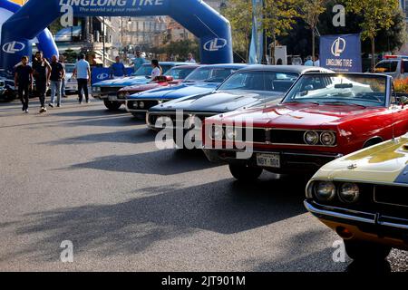 Beirut, Lebanon. 27th Aug, 2022. Classic cars are seen at an exhibition in Aley, Mount Lebanon Governorate, Lebanon, on Aug. 27, 2022. Over 65 classic car owners on Saturday gathered in Aley, a city in Mount Lebanon, showcasing their vehicles at an exhibition, where vintage collections from 1945 to 1978 parked in the city square drew the attention of many passers-by.TO GO WITH 'Feature: Lebanon's classic car enthusiasts deck out gems of collections' Credit: Bilal Jawich/Xinhua/Alamy Live News Stock Photo