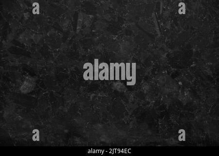 Black marble stone as a background close-up, black background Stock Photo