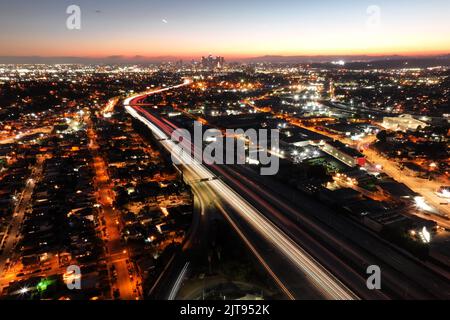 A general overall aerial view of the downtown Los Angeles skyline and Interstate 10 freeway, Sunday, Aug. 28, 2022. Stock Photo