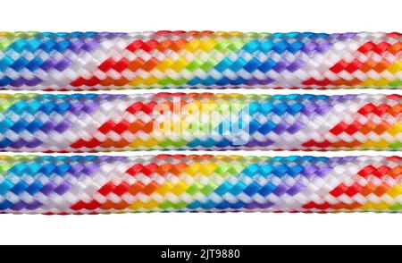 Three rainbow colored braided cotton cords isolated on white background. Stock Photo