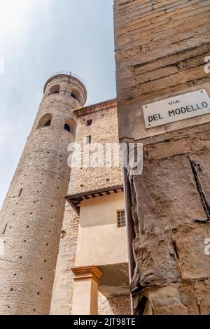 The ancient cylindrical bell tower of the Duomo seen from Via del Model in the historic center of Città di Castello, Perugia, Italy Stock Photo