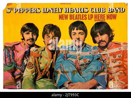 The Beatles, Sgt Peppers Lonely Hearts Club Band promo poster, New Beatles LP Here Now. Feat. Ringo Starr, John Lennon, Paul McCartney, George Harrison. 1967 Stock Photo