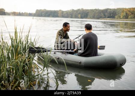 fishing boat on the river. Autumn, river and boat on the water. Trees on  the river. Autumn season Stock Photo - Alamy