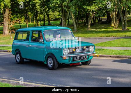1970 70s seventies AUSTIN MINI CLUBMAN Estate 1275cc petrol; arriving at the annual Stanley Park Classic Car Show in the Italian Gardens. Stanley Park classics yesteryear Motor Show Hosted By Blackpool Vintage Vehicle Preservation Group, UK. Stock Photo