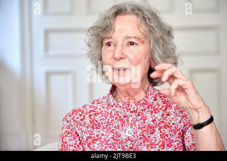 Hamburg, Germany. 24th Aug, 2022. Ulla Hahn, writer, gives an interview in her apartment about her new novel 'Days in Vitopia'. Credit: Georg Wendt/dpa/Alamy Live News Stock Photo