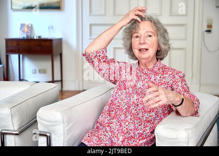Hamburg, Germany. 24th Aug, 2022. Ulla Hahn, writer, gives an interview in her apartment about her new novel 'Days in Vitopia'. Credit: Georg Wendt/dpa/Alamy Live News Stock Photo