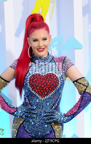 Justina Valentine walking on the black carpet at the 2022 MTV Video