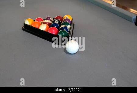 A billiard, pool or snooker table with the balls ready for a game Stock Photo