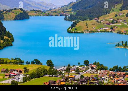 The famous Chalrutirank viewpoint overlooking Lungern, a municipality and place in the Swiss canton of Obwalden. Lungern is located on Lake Lungern an Stock Photo