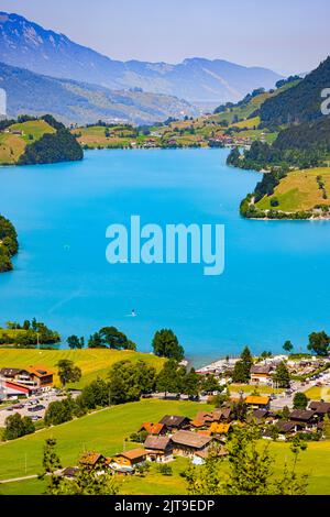 The famous Chalrutirank viewpoint overlooking Lungern, a municipality and place in the Swiss canton of Obwalden. Lungern is located on Lake Lungern an Stock Photo