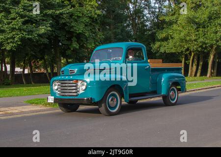 1949 American 40s, forties FORD 3900cc Petrol, Regular Cab Long Box 4-Wheel Drive Work Truck; USA Utility vehicles arriving at the annual Stanley Park Classic Car Show in the Italian Gardens. Stanley Park classics yesteryear Motor Show Hosted By Blackpool Vintage Vehicle Preservation Group, UK. Stock Photo