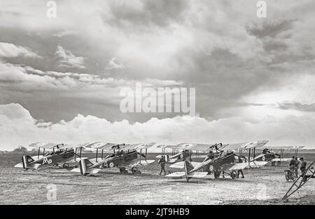 SE5a fighter aeroplanes of No. 6 (Training) Squadron, Australian Flying Corps (AFC), at aerodrome. (1/2r s. Avro 504K in background. The Royal Aircraft Factory S.E.5a was a British biplane fighter aircraft of the First World War. It was one of the fastest aircraft of the war, while being both stable and relatively manoeuvrable. Stock Photo