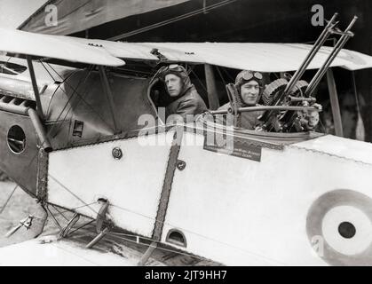 A Major Syd Addison and Lieutenant Hudson Fysh in a Bristol F.2B Fighter, a British First World War two-seat biplane fighter and reconnaissance aircraft often simply called the Bristol Fighter, or 'Biff'. The F.2B version proved to be a manoeuvrable aircraft that was able to hold its own against single-seat fighters while its robust design ensured that it remained in military service into the early 1930s. Stock Photo