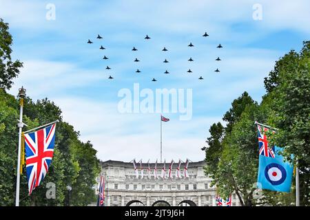 22 Eurofighter Typhoon FGR4 fighter plane RAF ensign centenary flypast over The Mall London flying in 100 figure formation Union Jack flag England UK Stock Photo