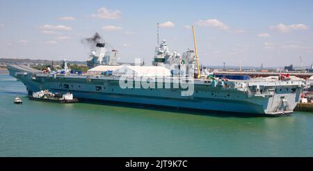 A view of the HMS Queen Elizabeth (R08) Aircraft Supercarrier in Portsmouth Harbour, Portsmouth, Hampshire, England, Europe Stock Photo