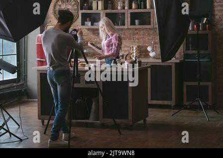 online recipe woman tablet backstage photography Stock Photo