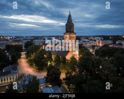 Aerial view of illuminated Turku Cathedral in summer night in Turku, Finland Stock Photo