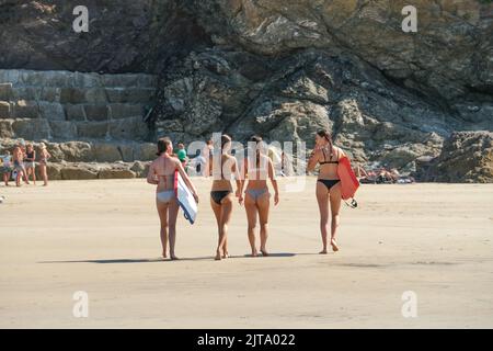 Polzeath, Cornwall, UK. 29th August 2022. UK Weather. Bank holiday monday brought the best weather of the weekend for visitors to Polzeath beach in Cornwall. Credit Simon Maycock / Alamy Live News Stock Photo
