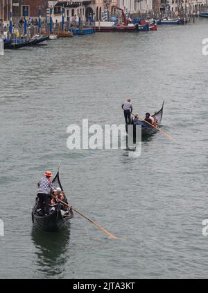 Two gondolas riding in the grand Canal Stock Photo