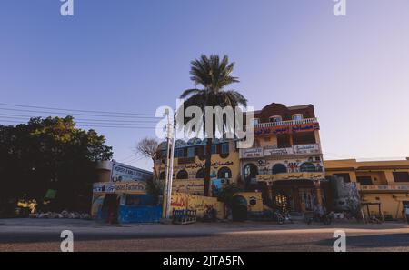 Luxor, Egypt - November 13, 2020: Local Egyptian Buildings and Sightseeing places near the main Road Stock Photo