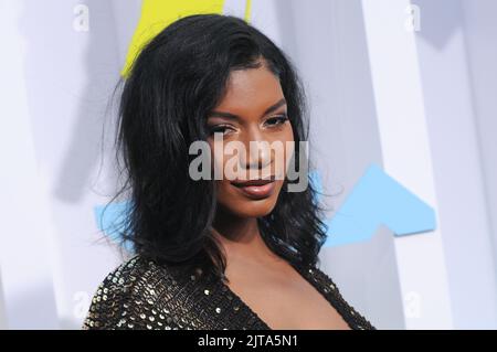 Taylor Rooks walking on the black carpet at the 2022 MTV Video Music ...