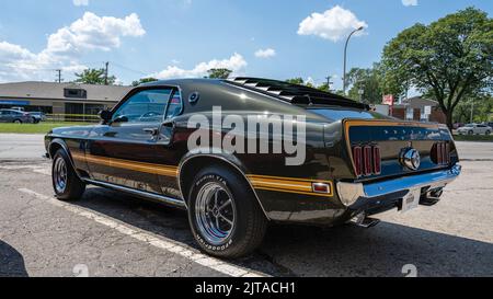 ROYAL OAK, MI/USA - AUGUST 19, 2022: A 1969 Ford Mustang Mach 1 car at the Ford exhibit on the Woodward Dream Cruise route. Stock Photo