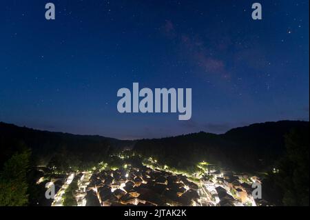 QIANDONGNAN, CHINA - AUGUST 28, 2022 - Photo taken on the night of Aug 28, 2022 shows the scenery of Dong village under the starry sky in Qiandongnan, Guizhou Province, China. (Photo by CFOTO/Sipa USA)